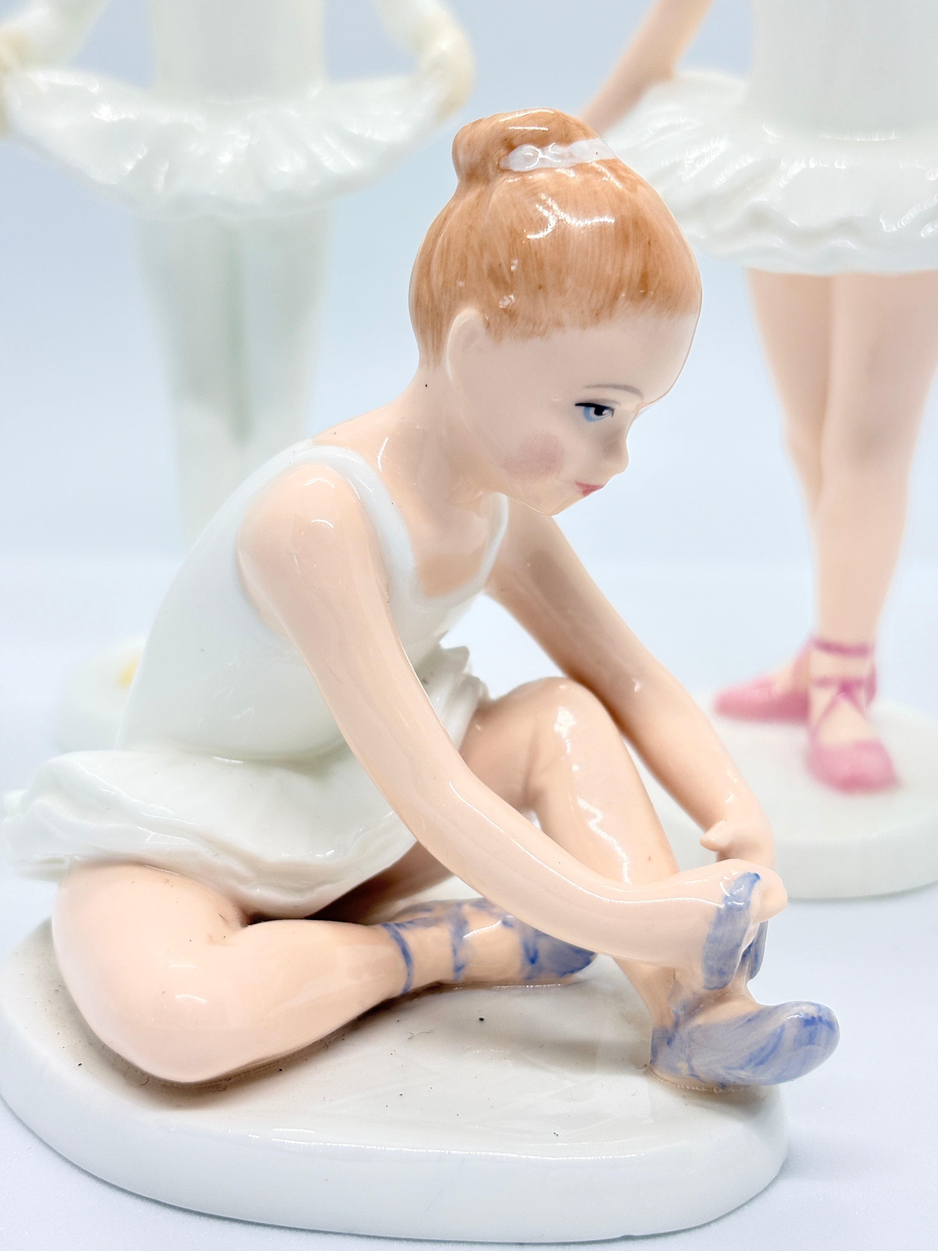 Three Royal Doulton Ballet figures, Ballet Class , little Ballerina,& Ballet Shoes dated 1995-92 & 92.